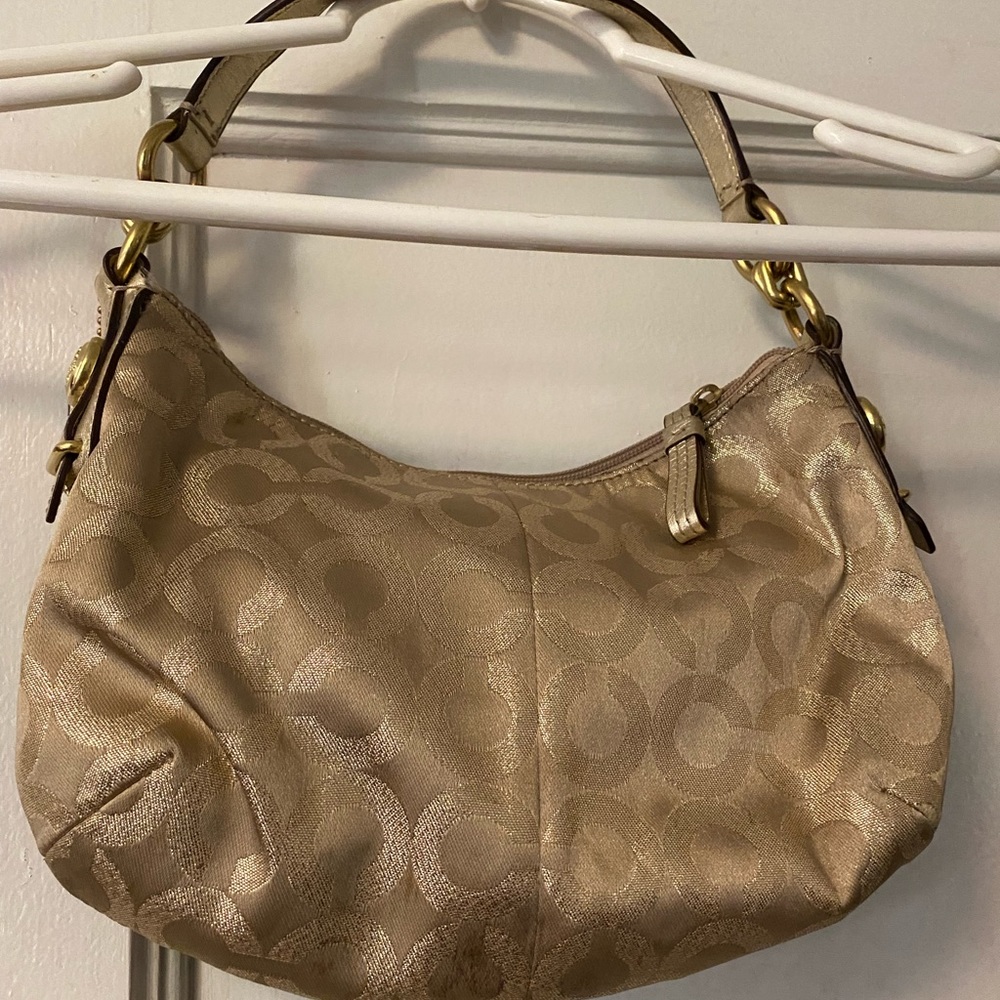Coach small gold handbag